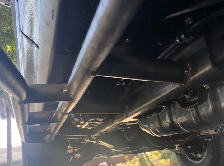 Raw steel rock slider bolted on to Toyota 4Runner